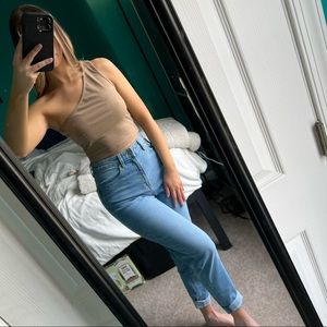 Lightly worn tan one shoulder top